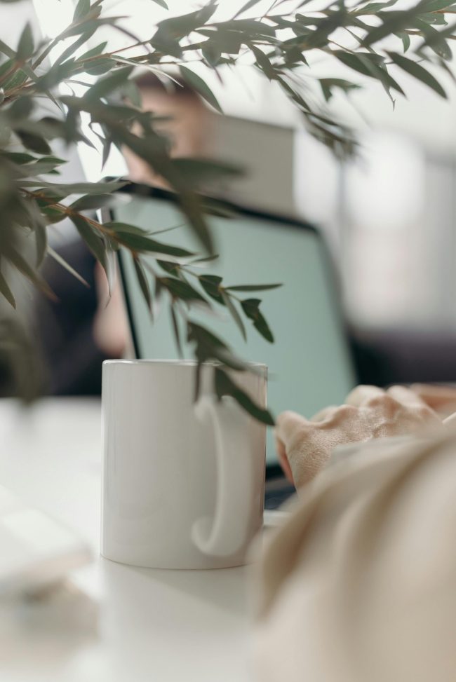Woman working on laptop | online counselling Maidenhead